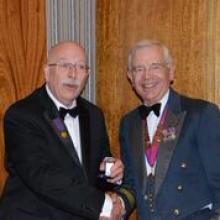 Helmore Pitchfork Bar Presentation Peter Helmore receives his bar to the Award of Merit in Gold